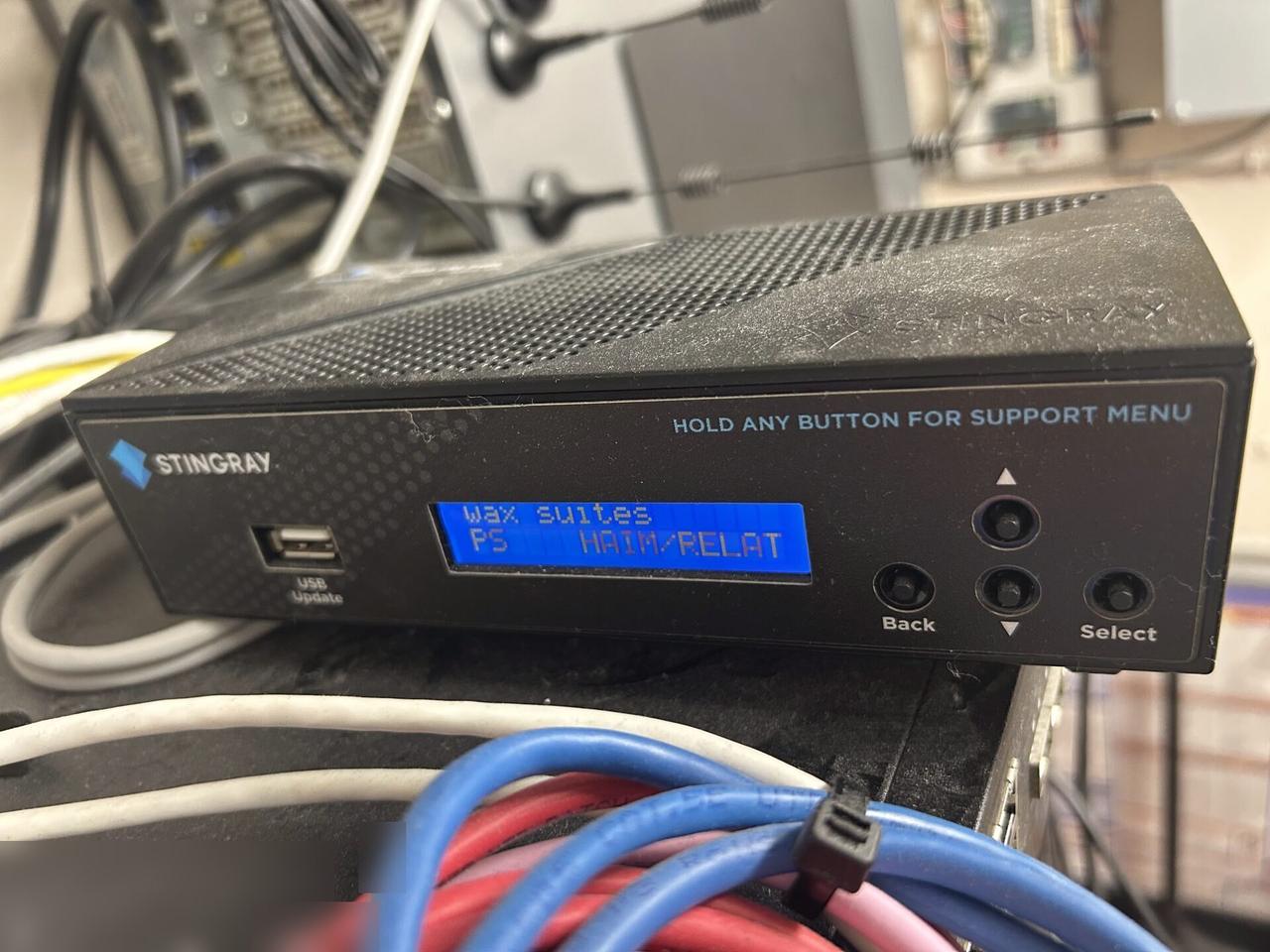 Alrty portfolio view of low-voltage hardware and device cabling with private labels omitted