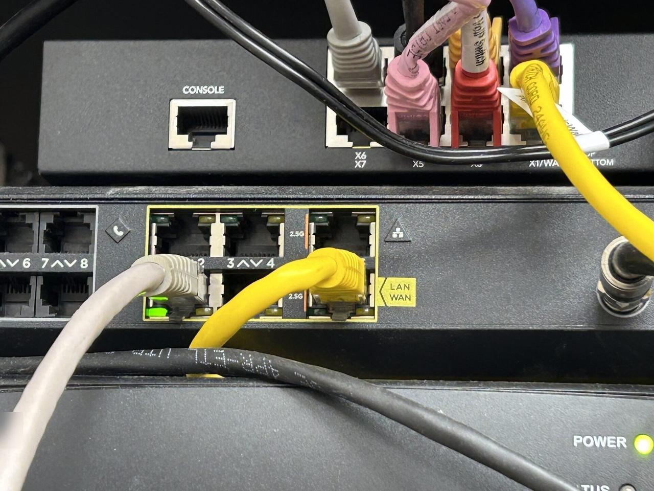 Alrty field photo with low-voltage hardware and device cabling during cable path verification