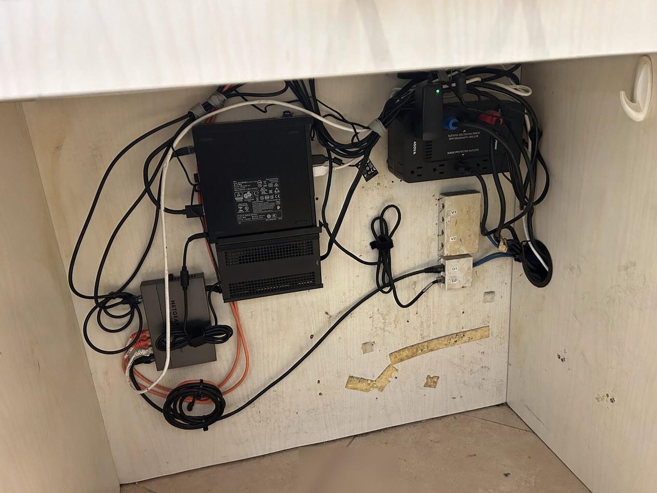 Onsite service photo showing POS workstation hardware at a retail service lane for payment hardware service
