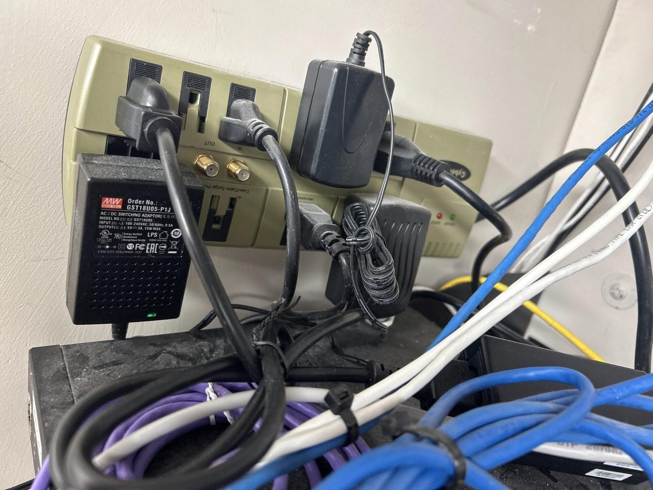 Server-room cabinet and structured network equipment inside the equipment cabinet during an Alrty onsite service visit