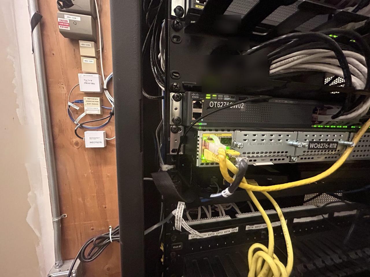 Real low-voltage field photo showing physical cable/device context that requires onsite support