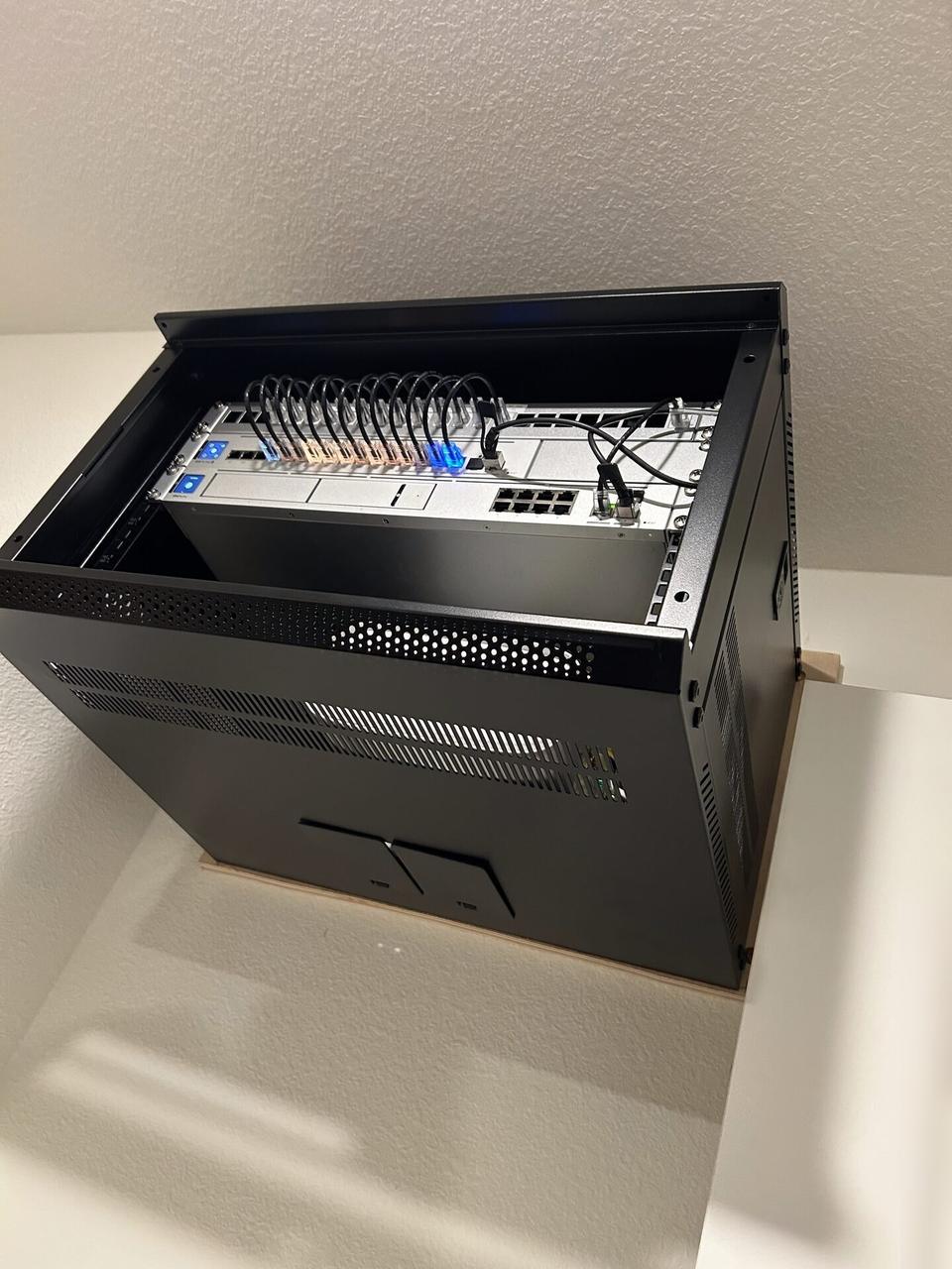 Ubiquiti-style security network cabinet during an Alrty onsite service visit