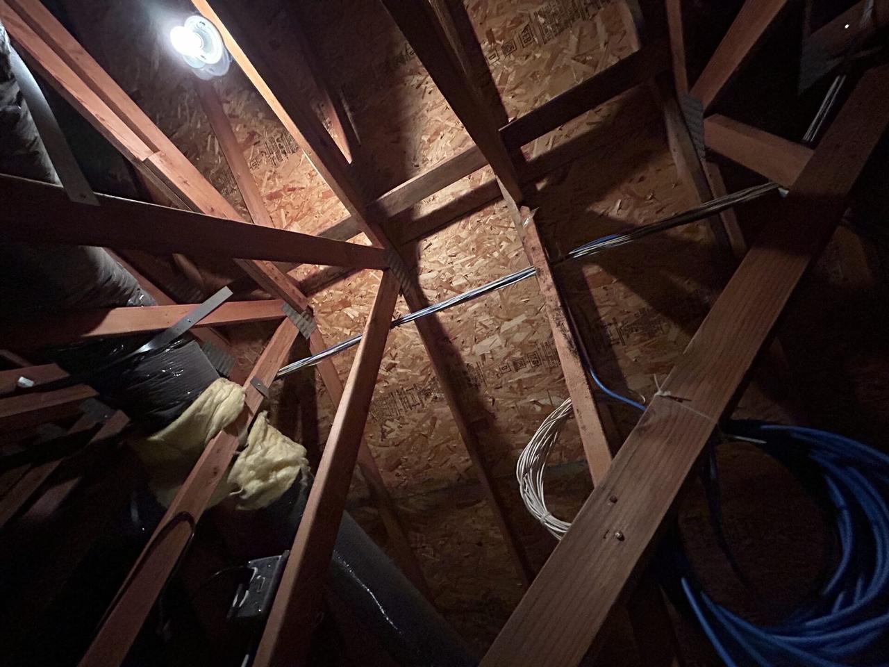 Onsite service photo showing attic security, network and low-voltage work