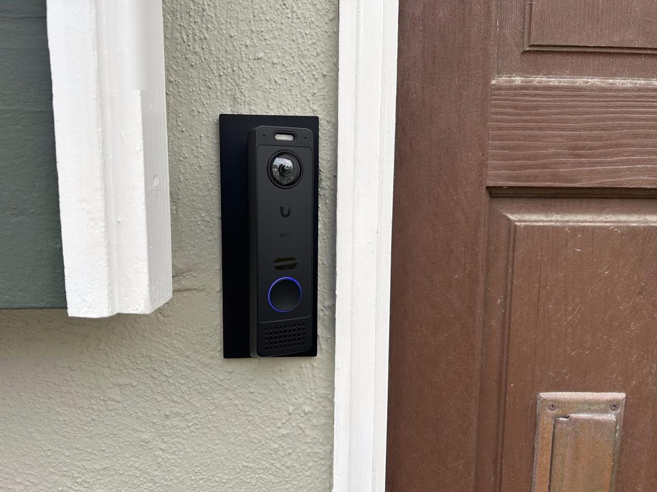 Exterior doorbell at an entry door during an Alrty onsite service visit