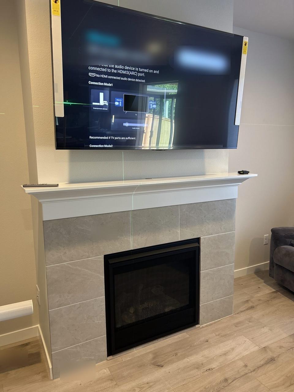 Onsite service photo showing streaming device and television setup context for home theater support