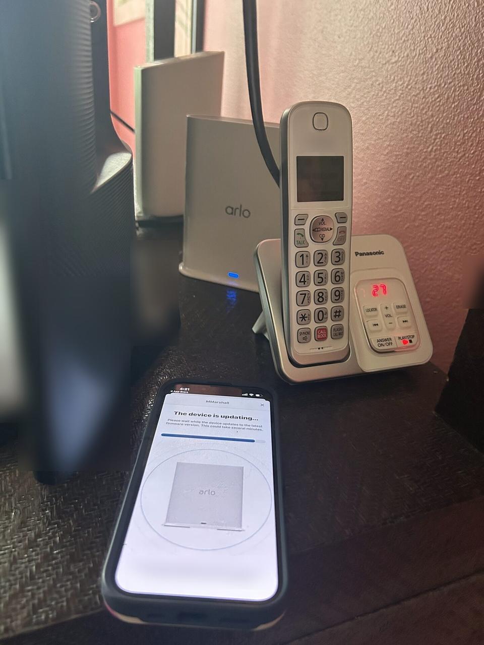 CCTV equipment and camera network handoff during security device setup documented for a smart technology service call