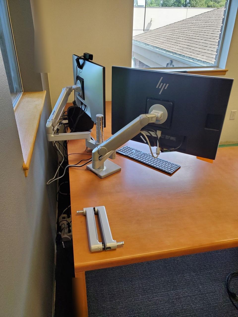 Onsite service photo showing workstation service detail for office technology with private screen details omitted