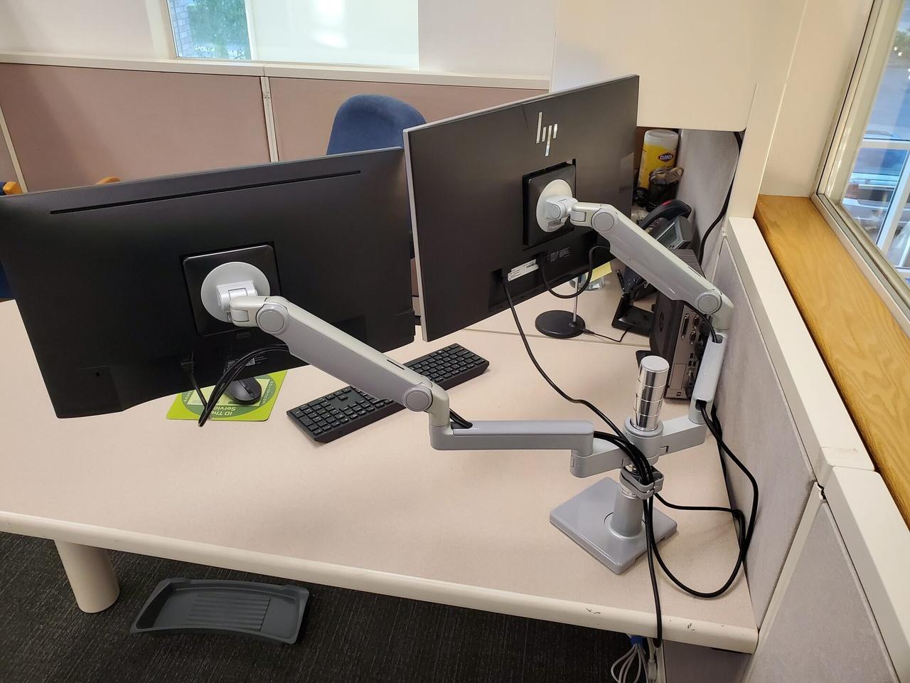 Alrty field photo with workstation service detail for office technology during desk-side setup