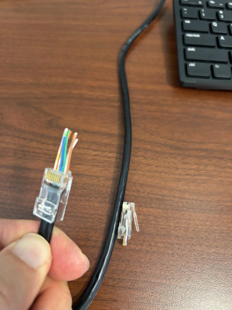 Public-safe portfolio image of low-voltage cable routing and device handoff for a connected device install
